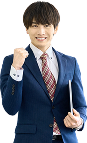 ガッツポーズをするスーツ姿の男性